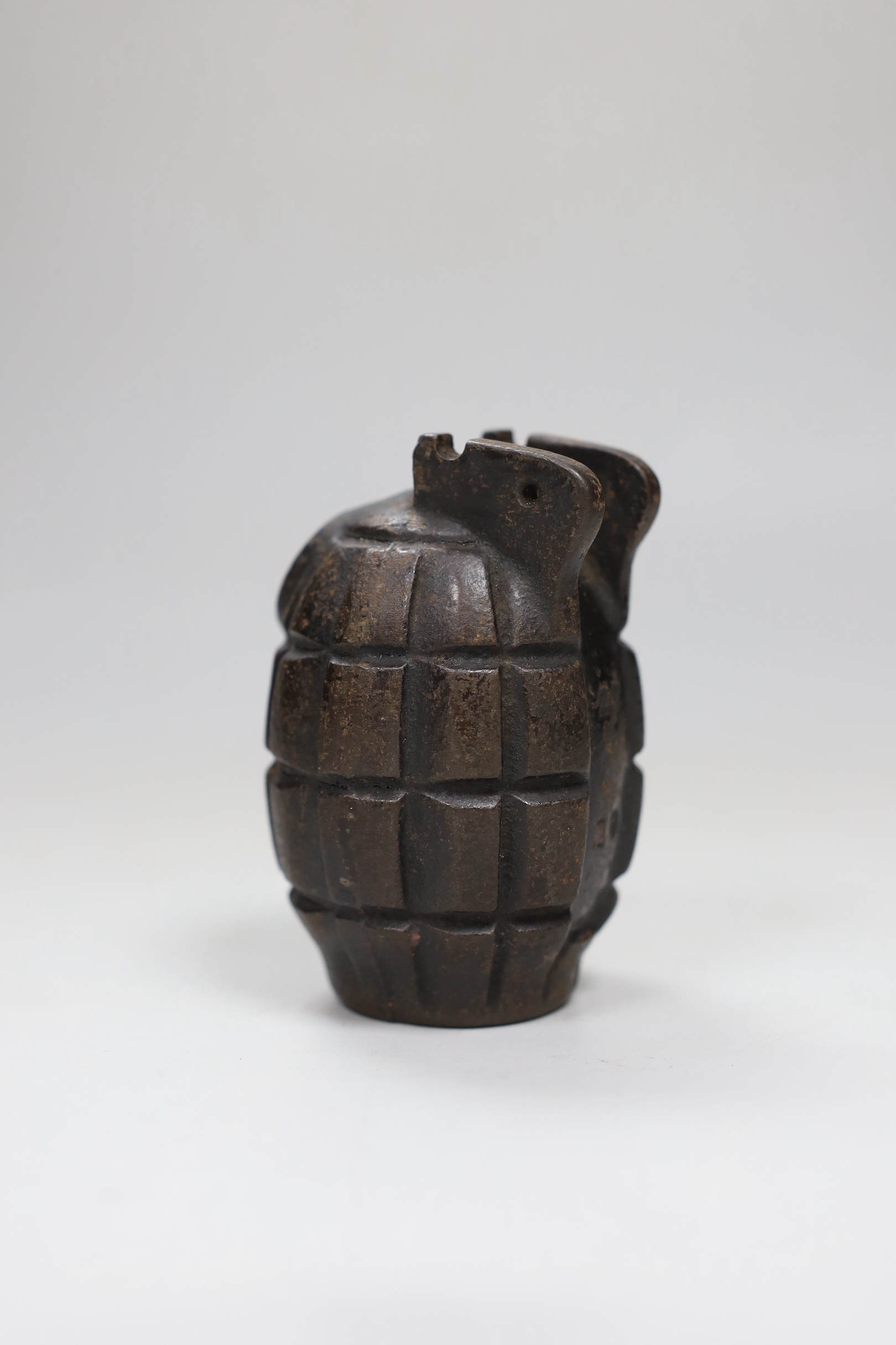 A World War II army hand grenade shell, 9cm high